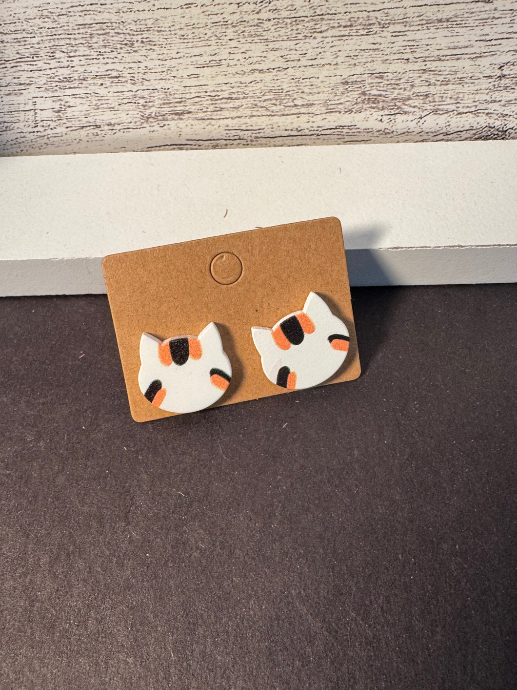 Orange and black stripe cat studs