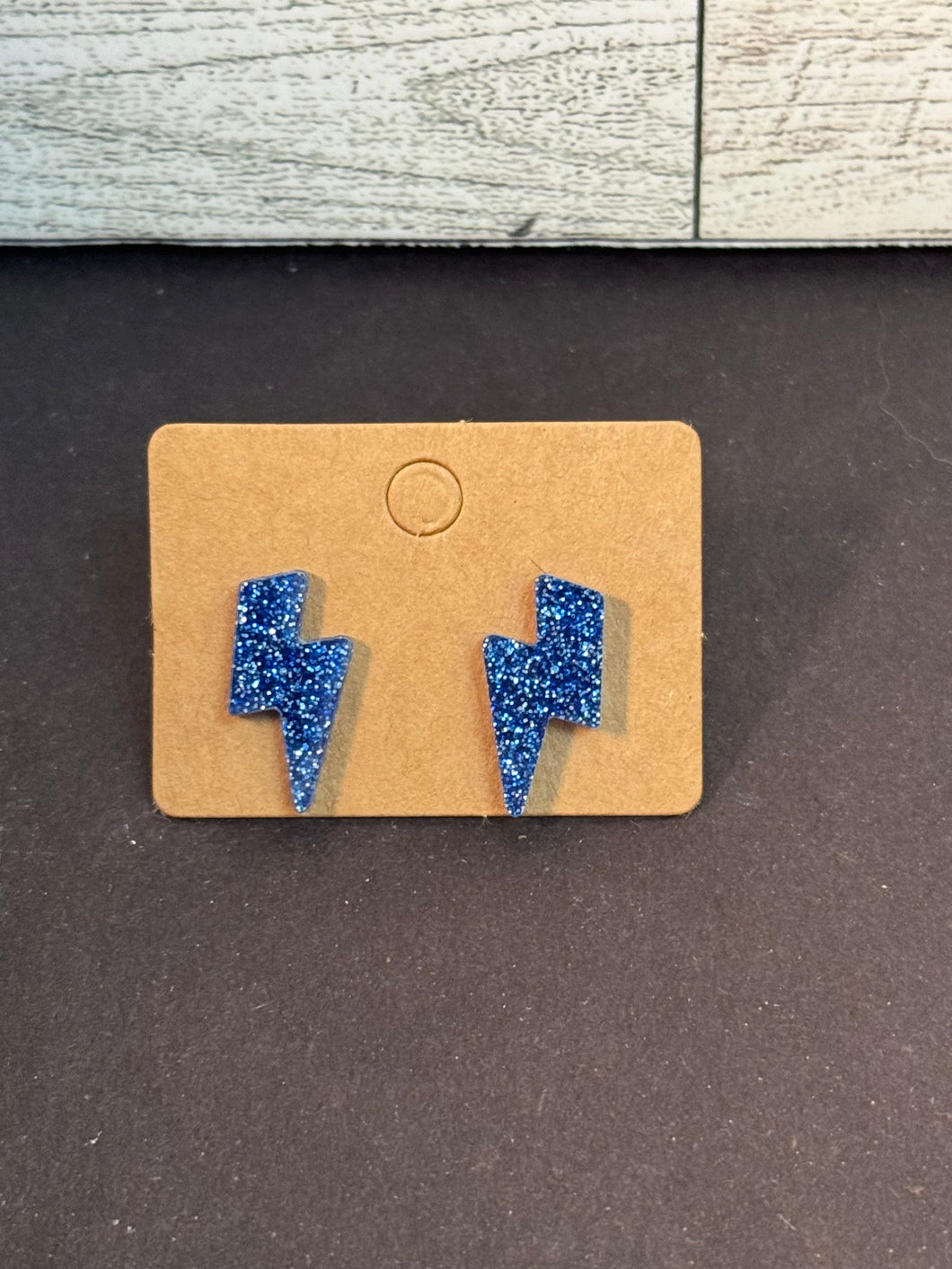 Blue glitter lightening bolt studs