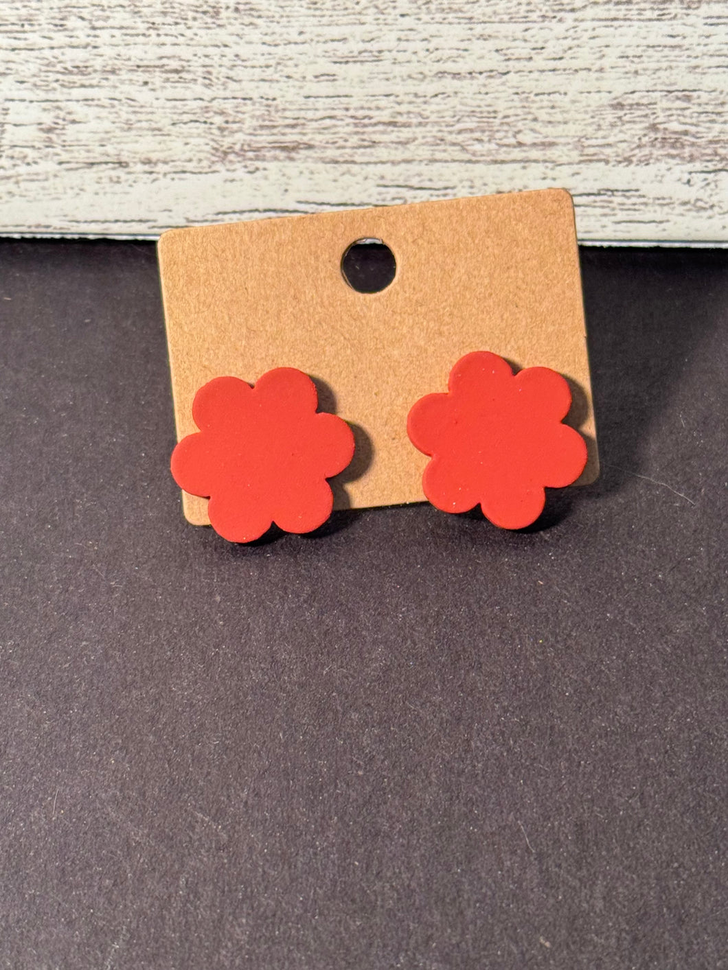 Burnt orange flower studs