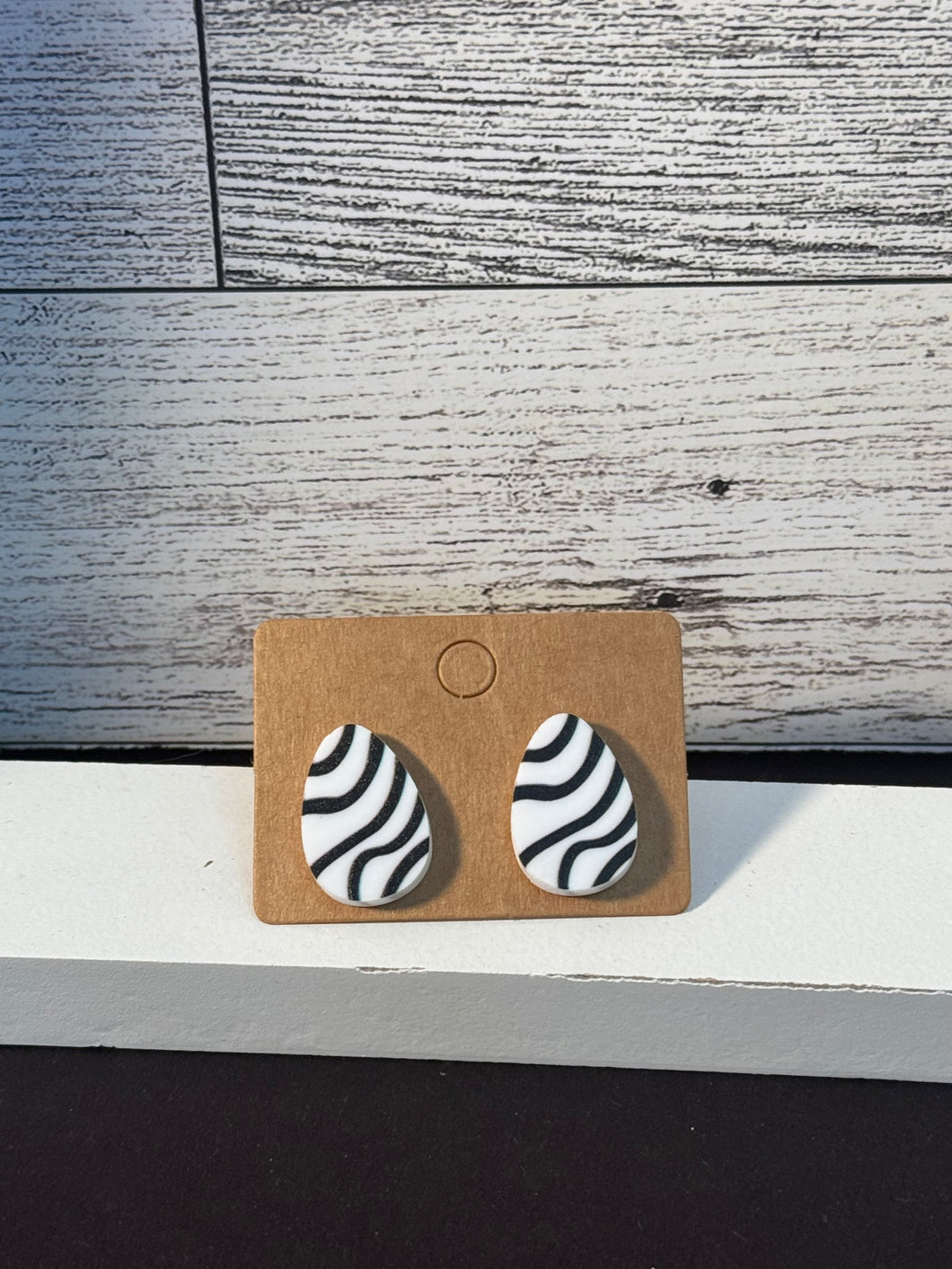 Black and white egg studs