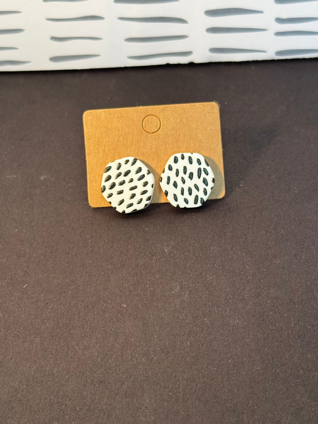 Black and white speckle studs
